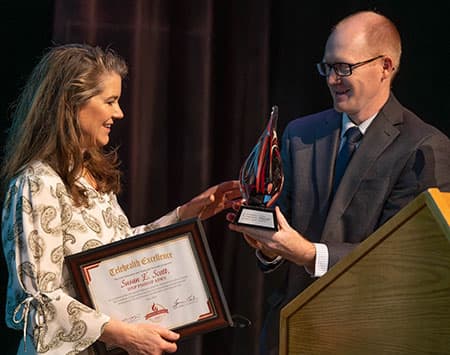 Susan E. Scott recieving award